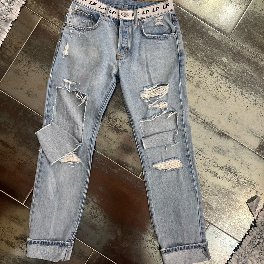 LF The Brand Women’s Y2K Light Wash Ripped Logo Jeans Size 25